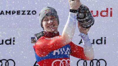 Alpine skiing-Odermatt beats rival Kilde in Cortina