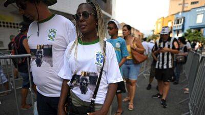 Fireworks greet Pele’s coffin as Brazil bid legend farewell