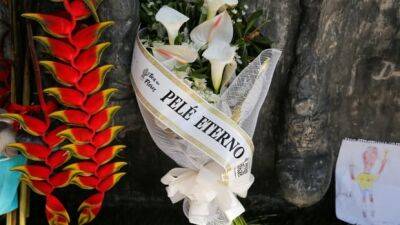 Brazil prepares to bury legend Pelé in city he made famous