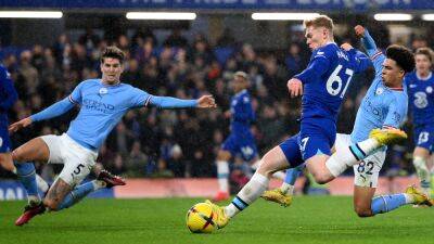 John Stones fires title warning to leaders Arsenal