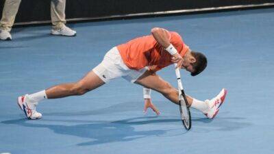 Novak Djokovic advances to Adelaide final despite leg injury