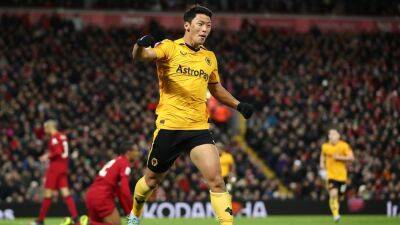 Collins stars as Wolves take Liverpool to Cup replay