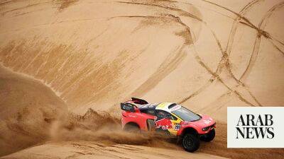 Nasser Al-Attiyah - Carlos Sainz - prince Harry - Loeb wins KSA Dakar Rally stage after Sainz penalty for speeding - arabnews.com - Brazil - Usa - Dubai - Saudi Arabia -  Dakar -  Riyadh - county Lucas - Iraq