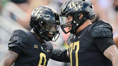 Julio Aguilar - UCF's Timmy McClain avoids multiple tackles in gritty play to keep drive alive; Baylor gets last laugh - foxnews.com - state Colorado