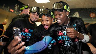 Marlins clinch playoff spot after full MLB season for first time in 20 years