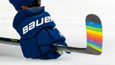 NHL bans players' use of Pride Tape after previously disallowing themed warmup jerseys