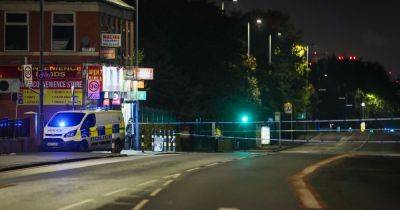 Huge police response and cordon in place amid incident on Ashton Old Road - live updates
