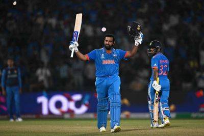 Chris Gayle - Rohit Sharma - Sachin Tendulkar - Ishan Kishan - Hashmatullah Shahidi - Ibrahim Zadran - Rohit's record hundred blasts India to World Cup victory over Afghanistan - thenationalnews.com - South Africa - Zimbabwe - India - Sri Lanka - Afghanistan - county Chase