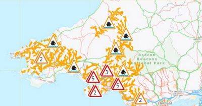 Live updates as M4, other roads and train tracks flooded and multiple warnings in place