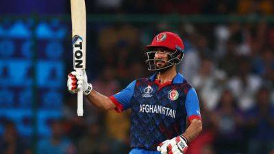 Harry Brook - Mujeeb Ur - Afghanistan stun champions England at World Cup - channelnewsasia.com - Scotland - Afghanistan