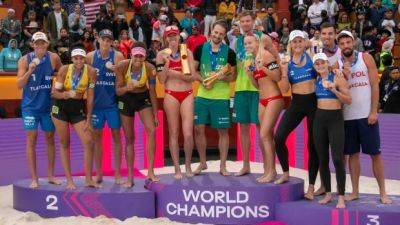 U.S. beach volleyball duo Cheng, Hughes win world title, clinch Olympic quota spot