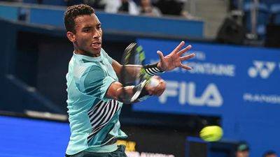 Auger-Aliassime overcomes shaky start at Japan Open to defeat Australian in 1st round