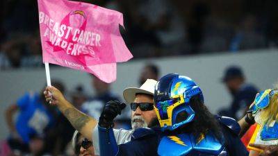 Overzealous Chargers fan's reactions to close game goes viral, sparks theories