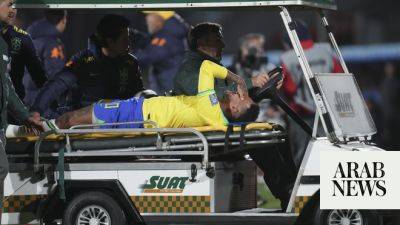 Neymar leaves Brazil match in tears with apparent left knee injury