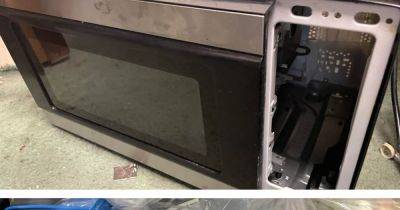 Illegal cigarettes found hidden in 'stripped back' microwave in store raid - manchestereveningnews.co.uk - Britain