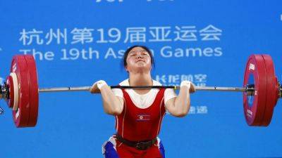 Games-North Korea sets another weightlifting world record at Asian Games