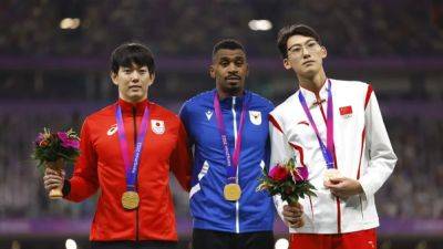 Hurdlers take dual golds, North Korea set another weightlifting record