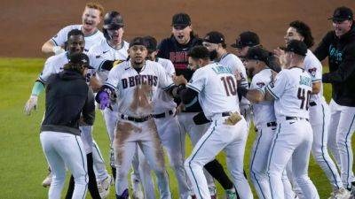 Marte hits walk-off single in 9th inning as D-backs trim Phillies' series lead in NLCS