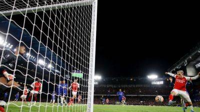 Arsenal fight back from two goals down to draw at Chelsea
