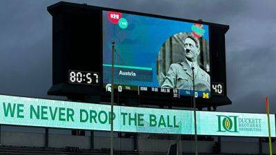 Michigan State apologizes for Hitler image on big screen - ESPN - espn.com - state Michigan