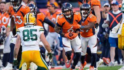 Broncos get late field goal, interception for victory over Packers