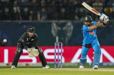 Virat Kohli overcomes fog and New Zealand to continue India's World Cup march