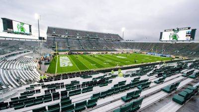 Michigan State suspends employee after image of Hitler is displayed on video board before kickoff