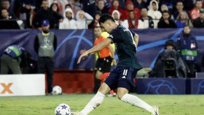 Martinelli and Jesus steer Arsenal to 2-1 win at Sevilla