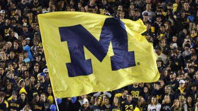 Sources -- Michigan staffer bought tickets for non-Big Ten games - ESPN