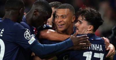 PSG ease past AC Milan to move top of Champions League group