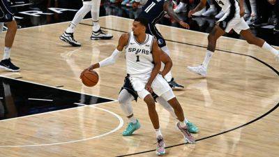 French star Wembanyama scores 15 points in NBA debut but Spurs lose to Mavericks