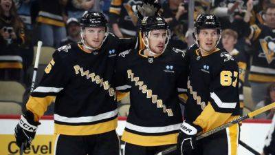 NHL roundup: Penguins end Avs' record road run