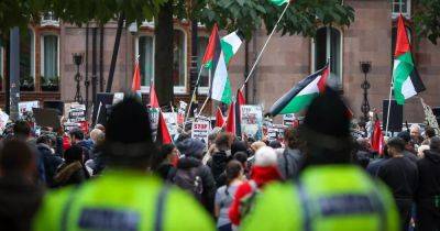 Thousands of pro-Palestine demonstrators gather in Manchester city centre