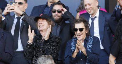 Mick Jagger and Ronnie Wood attend ‘El Clasico’ Spanish football clash