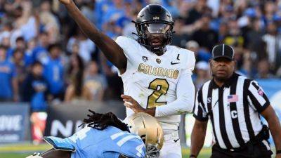 Colorado's Shedeur Sanders takes 'a beating' as Deion laments poor protection vs. UCLA - ESPN