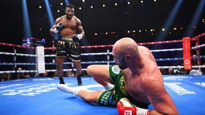 Fury survives knockdown in split decision Ngannou win