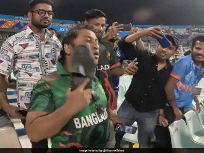 Shakib Al-Hasan - Scott Edwards - Bas De-Leede - Watch: Frustrated Bangladesh Fan Beats Himself Up With Shoe After Disappointing Loss To Netherlands - sports.ndtv.com - Netherlands - Australia - South Africa - Sri Lanka - Bangladesh - Pakistan - county Garden