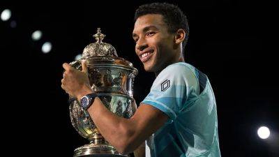 Auger-Aliassime wins 1st ATP title of season, repeating as Swiss Indoors champion