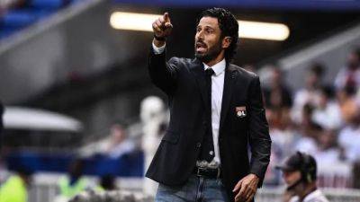 Coach Fabio Grosso hurt as Lyon team bus comes under attack before French league game