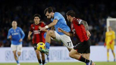 Napoli come from behind to hold Milan to 2-2 draw