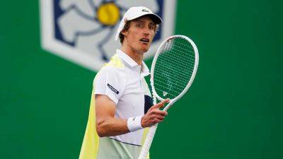 Australian tennis star Marc Polmans disqualified after hitting ball in umpire's face