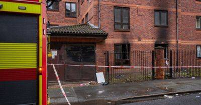 Man arrested for arson after fire at block of flats with residents evacuated