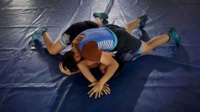 Indian school for wrestling helps women chase better life and glory - channelnewsasia.com - India