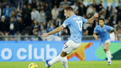 Lazio's Immobile denies Fiorentina place in top four with late penalty