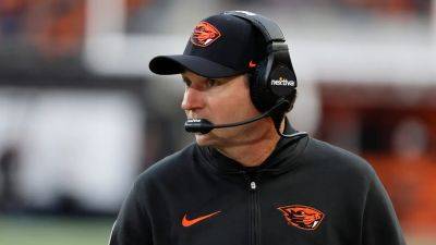 Oregon State coach Jonathan Smith issues an apology after making 'milking' gesture during game against Utah