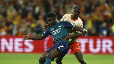 Arsenal suffer double blow with Saka injured in loss to Lens