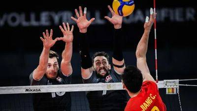 Canadian men in Olympic volleyball qualifying position with 3-set sweep of China