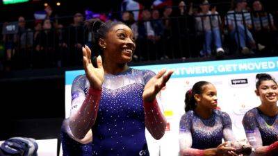 Simone Biles leads U.S. women to team title at gymnastics world championships - ESPN