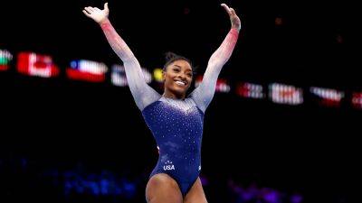 Biles leads US to seventh World Championships gold