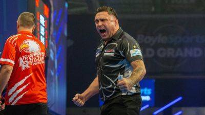 Michael Smith and Gerwen Price ease into World Grand Prix last eight